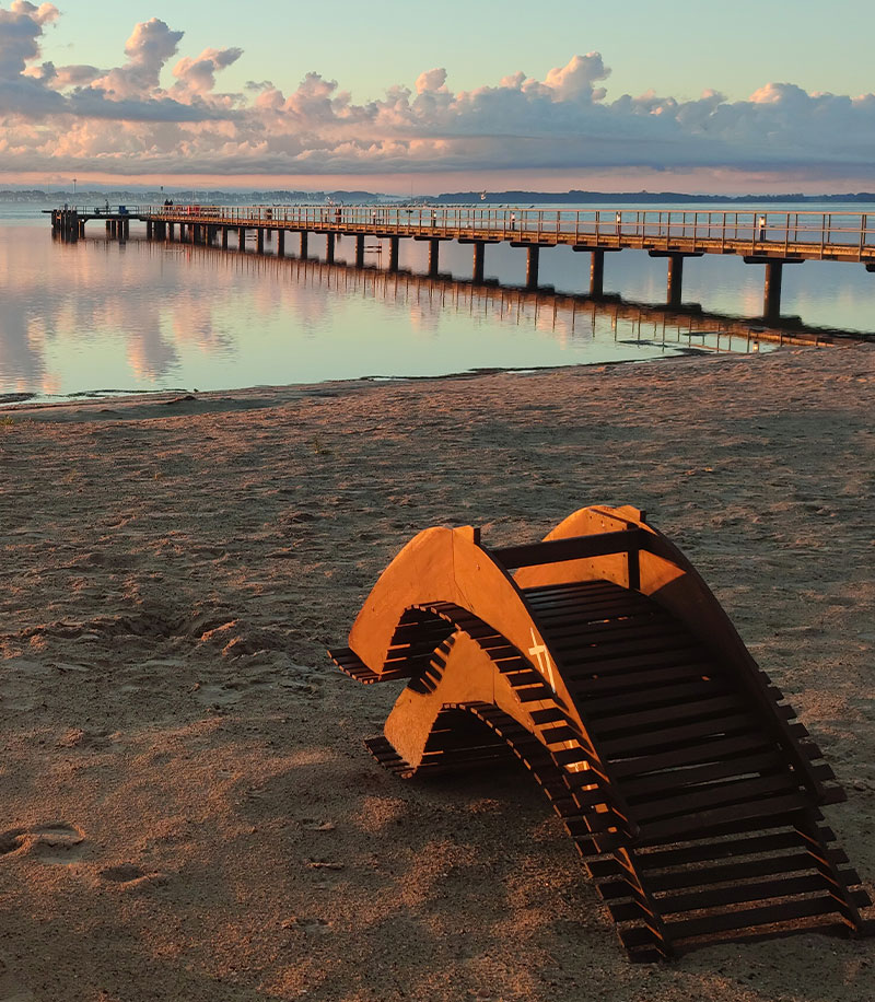 Strandhotel-dranske-ruegen-insel-urlaub-wasser-sonnenuntergang-seebrücke